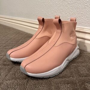 Champion Women's pale Pink High-Top Sneakers
New without tag leather!